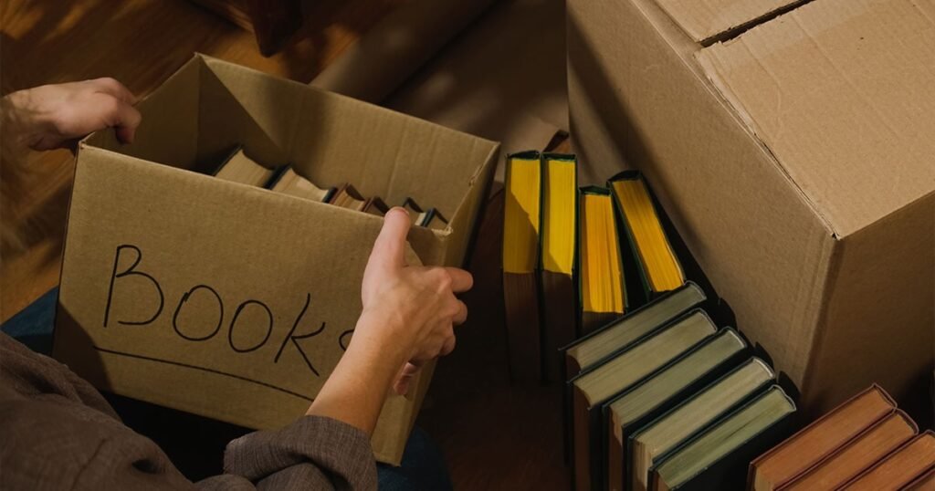 A step-by-step guide on efficiently packing books for moving, featuring boxes, packing materials, and organized stacks.