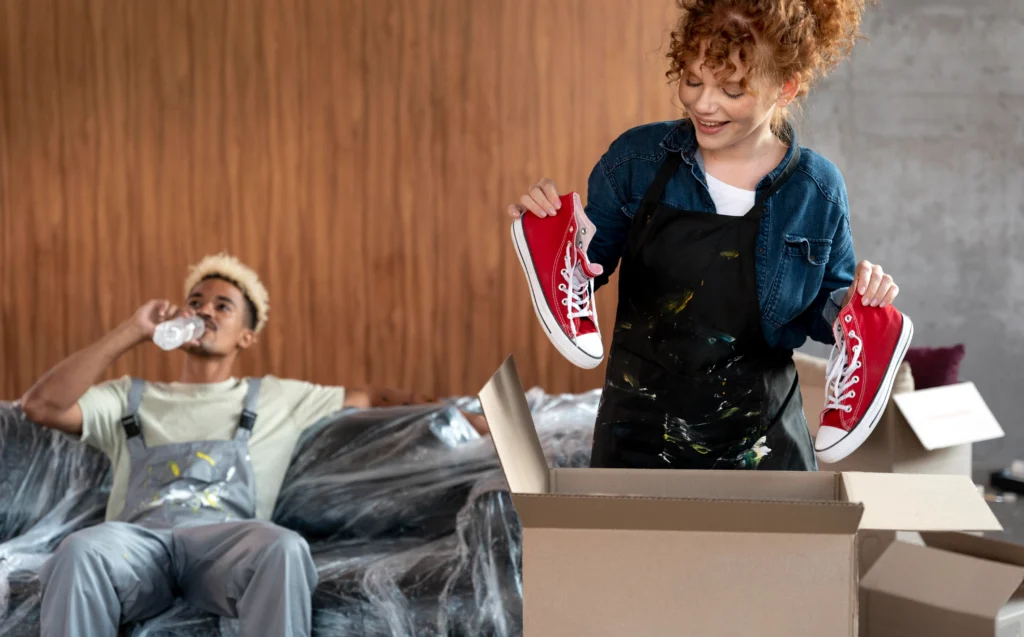 Organized shoe packing in clear plastic boxes for moving