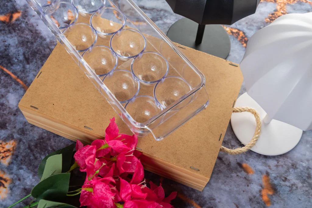 A person with a brown paper bag featuring a glass, showcasing effective methods for packing glasses during a move.